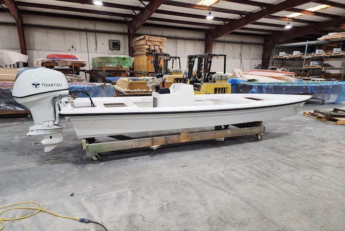 Fin & Feather side view, flats skiff