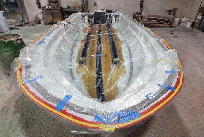 skiff hull being infused